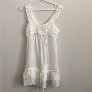 Simply irresistible cream peplum top size medium